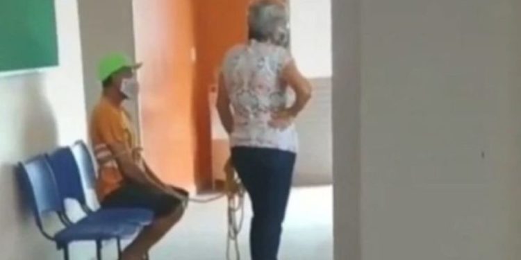 Gruaja lidh burrin me litar dhe e detyron që të vaksinohet